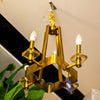 Geometric Brass Chandelier with Candle-Style Lights