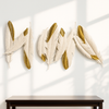 Elegant Feather Wall Art – White & Gold Metal Sculpture